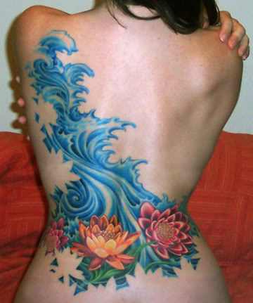 flowers tattoos on back. -flower lower ack tattoos