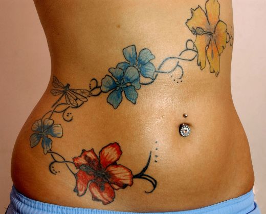 flower on vine tattoos. flower on vine tattoos
