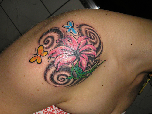 flower tattoos for girls. # Although the website Free Tattoo Designs states