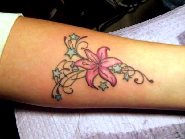 Flower Side Tattoos. flower wrist tattoos. flower