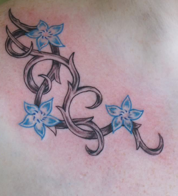 vine tattoo. flower vines tattoos. the