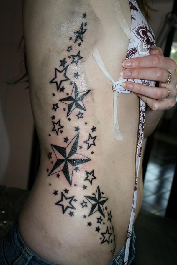 rose tattoos for girls on hip. star tattoos hip