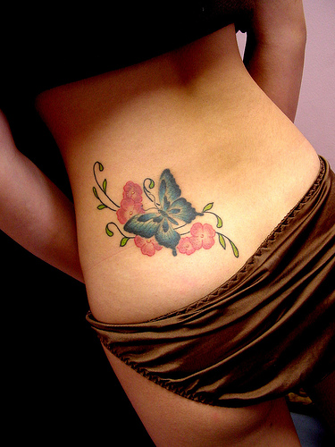omega sleeve tattoo angel jasmine and rose,
