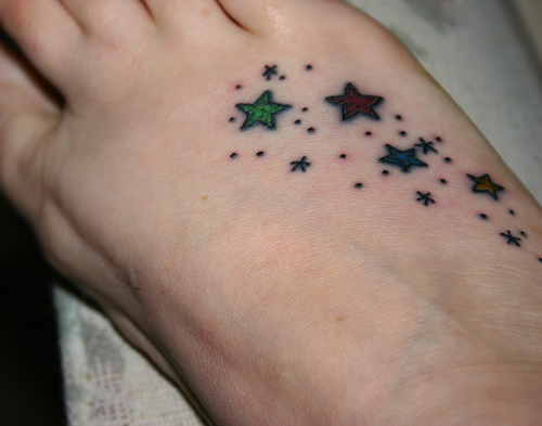 star outline tattoo. flower outline tattoos