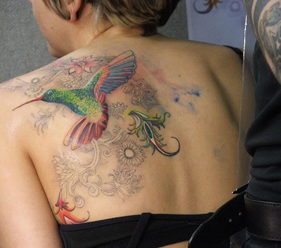 Jacqulynn and her beautiful Phoenix bird tattoo.