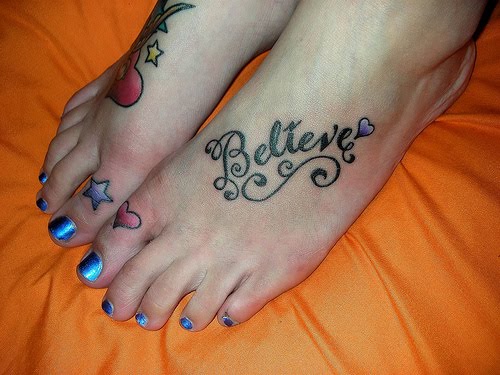 nautical star tattoos on foot. star tattoos on foot