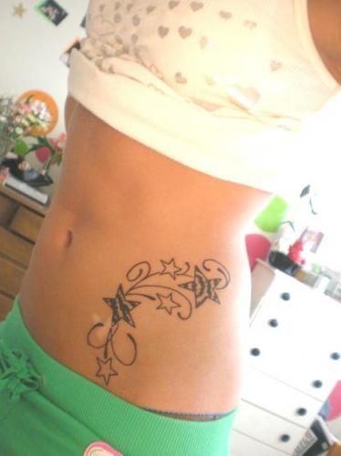 star tattoos on stomach. Source: tattoopicture