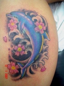flower-and-dolphin-tattoos